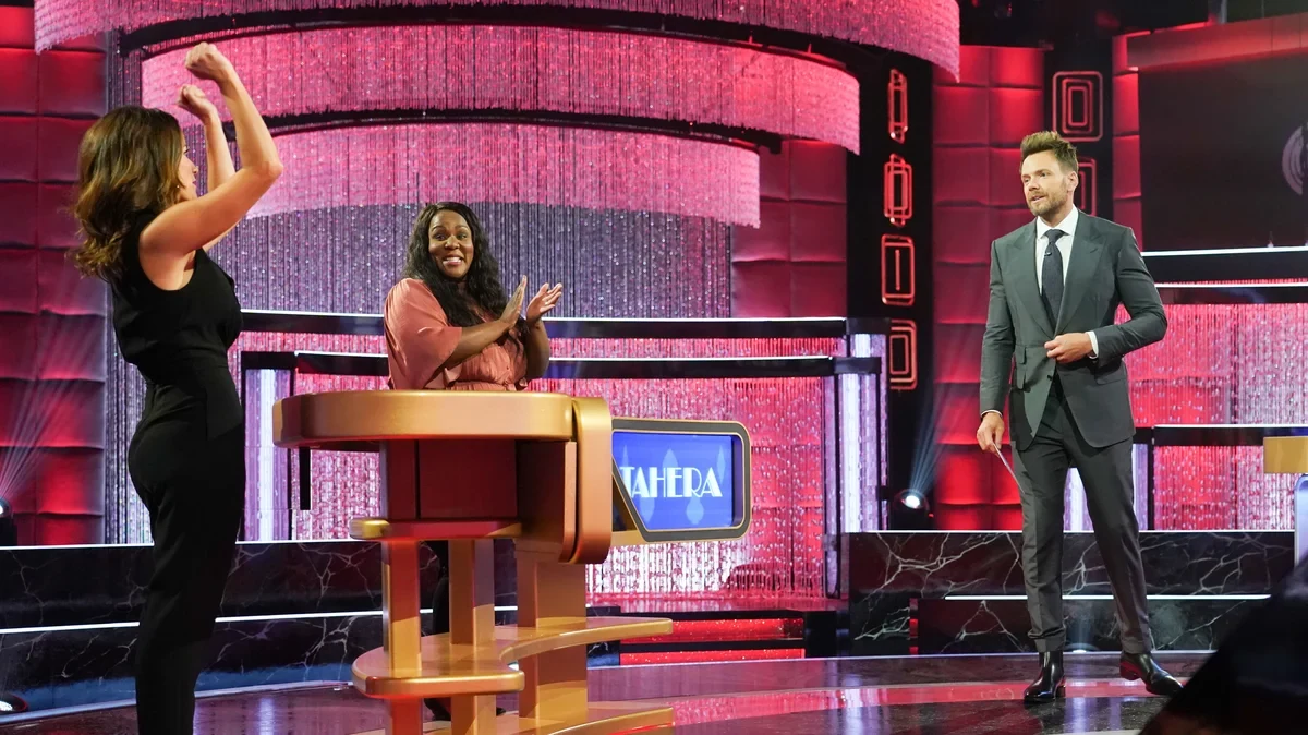 Card Sharks production set with contestants at the main game table