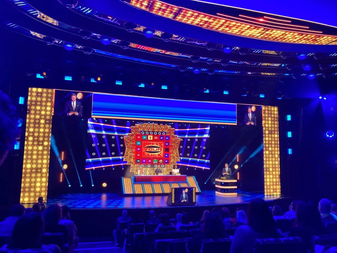 Press Your Luck LIVE theater production aboard Norwegian Cruise Line with the Big Board, host, contestants, and audience