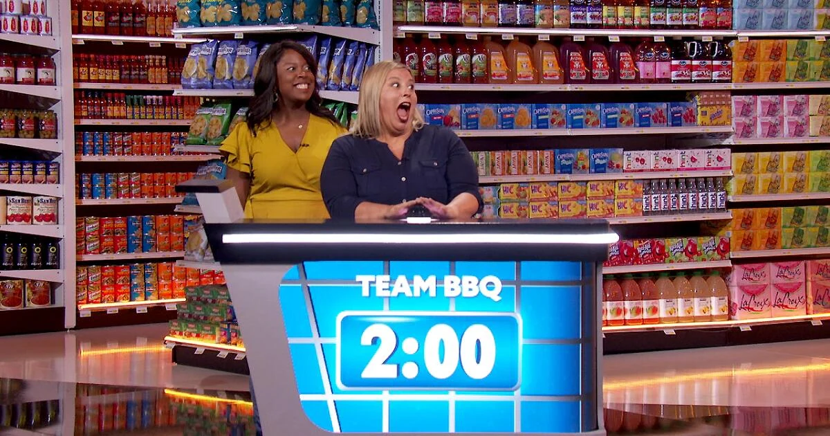 Supermarket Sweep production set with Team BBQ at a contestant podium